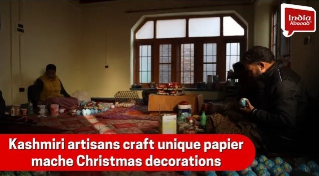 Kashmiri artisans craft unique papier mache Christmas decorations